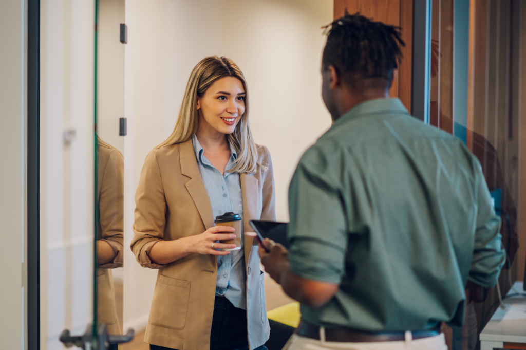 Two coworkers preparing for a difficult conversation at work
